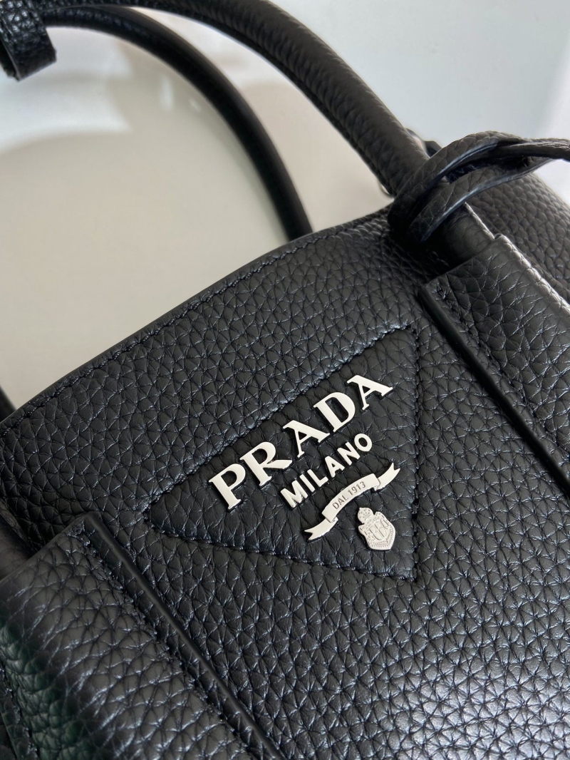 Pra*a top handle bags